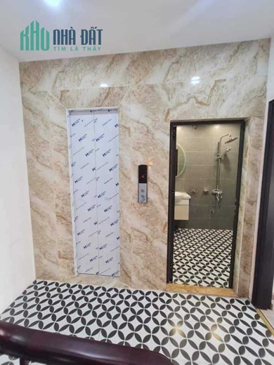 Bán Nhà Phố Nguyễn Khang 53/60m2 x 7 tầng thang máy, sát Phố, gara ô tô thông sàn kinh doanh, giá