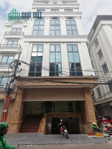 Bán tòa nhà Văn Phòng 8 tầng mặt phố Quang Trung Dt 216m2 Mt 9m.Giá 125 tỷ