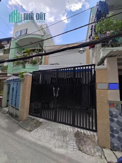 Bán nhà rộng 100m2 (1 Trệt 1 Lửng), có sân để xe trong nhà, Lê Văn Lương Quận 7