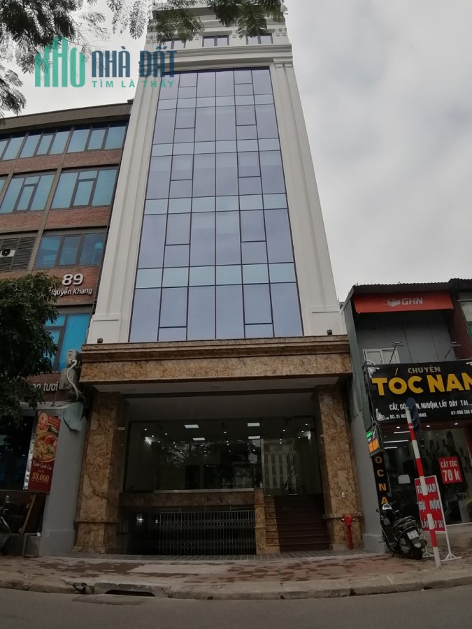 Cho thuê tòa nhà Văn Phòng mặt phố Nguyễn Khang DT 120m2 *9 tầng Mt 8m. Giá 8500USD/tháng