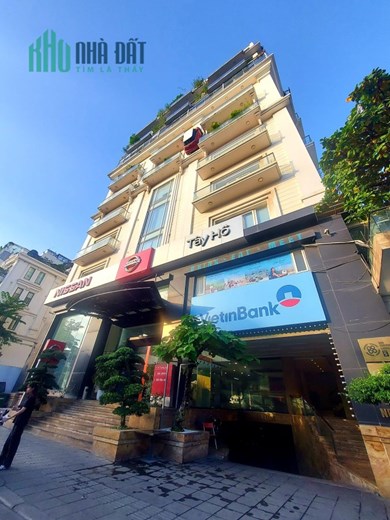 BÁN TÒA NHÀ ĐƯỜNG ĐÔI NGUYỄN PHONG SẮC 100M2, 9T, MT 7M, HÈ 5M, KD ĐỈNH.