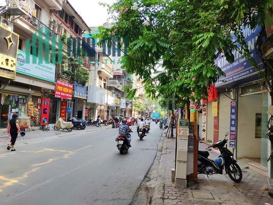 Giảm sâu nhà Mặt phố Chùa Láng giá 23 tỷ, 65m x 5T , hè 5m, Kinh doanh cực tốt