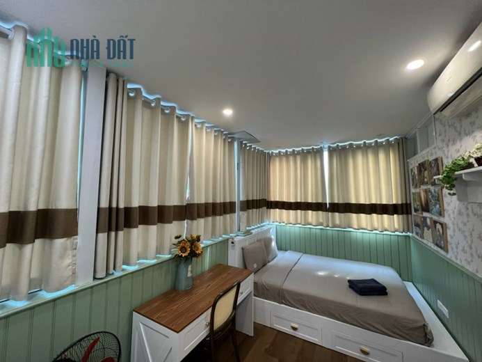 Bán toà nhà văn phòng và căn hộ cho thuê phố Linh Lang - Đào Tấn 90m2 x 8 t mt 7,3 m giá 37.5 tỷ