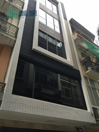 Chính chủ cần bán nhà mặt ngõ 121 Phố Thái Hà,Đống Đa dt 56 m2 x 7 t mt 5 m giá 30 tỷ