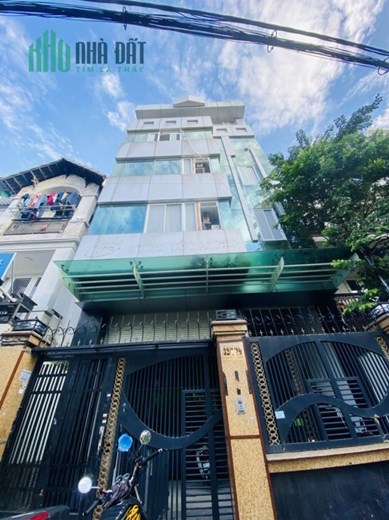 GẤP BÁN HẠ CHÀO 600 TRIỆU GIÁ BÁN 19.6 TỶ . TOÀ NHÀ 7 TẦNG CÓ HẦM,  THANG MÁY,16 PHONG CHO THUÊ.