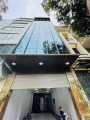 Tòa nhà mặt ngõ Phố Hoàng Cầu 75m2x8 tầng thang máy, lô góc, kinh doanh, vỉa hè ô tô tránh.